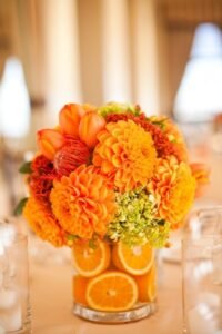 Arranjos de Flores para Mesa com laranja